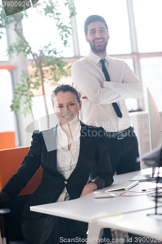 Image of portrait of business couple at office