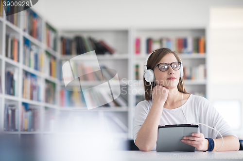 Image of female student study in library