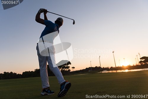 Image of golfer hitting long shot