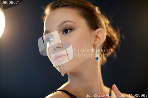 Image of beautiful young asian woman with earring