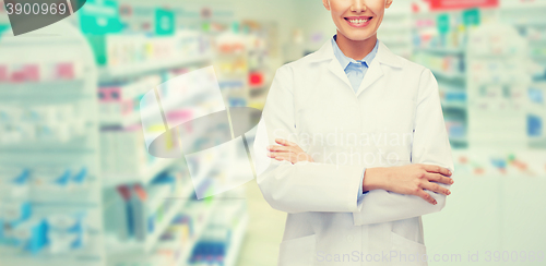 Image of young woman pharmacist drugstore or pharmacy