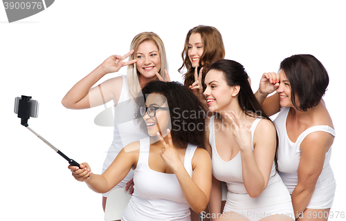 Image of group of happy women taking selfie by smartphoone