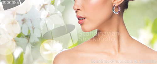 Image of close up of beautiful woman face with earring