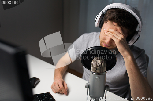 Image of close up of man losing computer video game