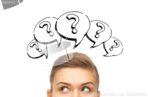 Image of happy young woman head with question marks