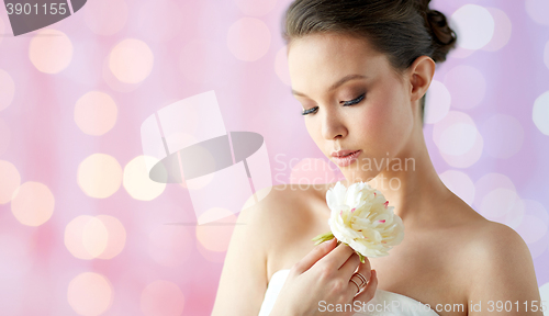 Image of beautiful asian woman with flower and jewelry