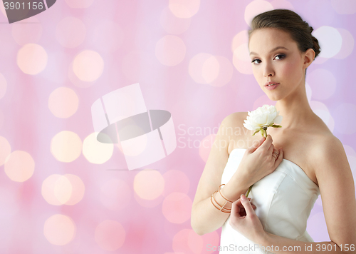 Image of beautiful asian woman with flower and jewelry