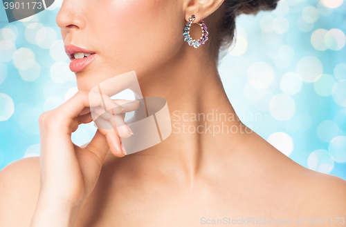 Image of close up of beautiful woman face with earring