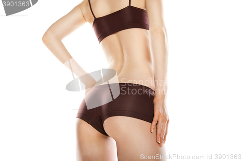 Image of Rear view of beautiful blond caucasian woman