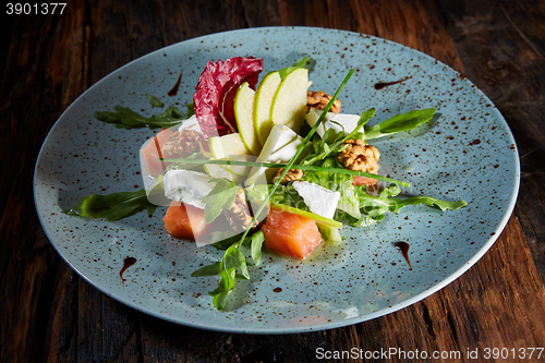 Image of Homemade salad with apple and salmon