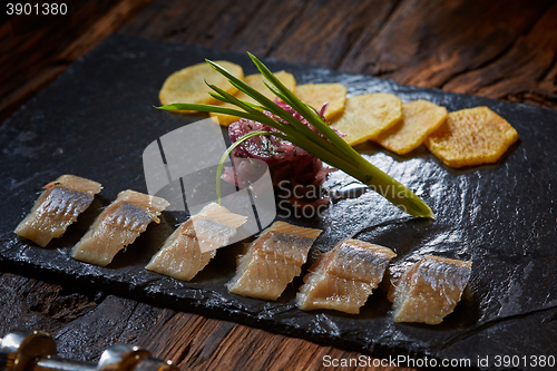 Image of herring with potatoes