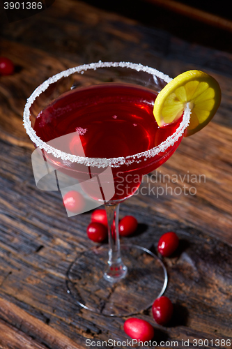 Image of Cosmopolitan cocktail top on bar