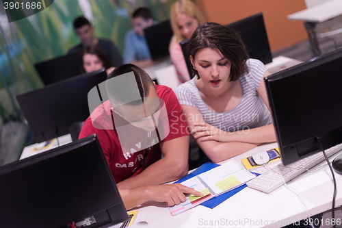 Image of technology students group working  in computer lab school  class