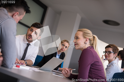 Image of business people group on meeting at modern startup office