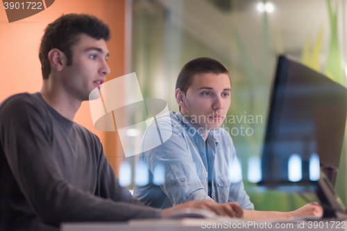 Image of technology students group working  in computer lab school  class