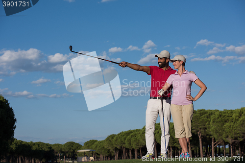 Image of portrait of couple on golf course