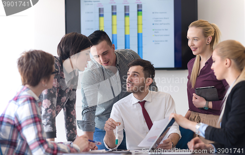 Image of young business people group on meeting at modern office