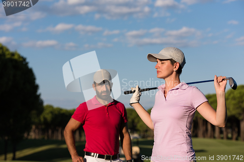 Image of portrait of couple on golf course