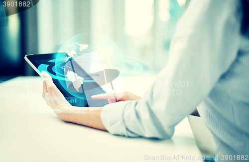 Image of close up of woman hands with tablet pc at office