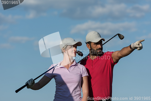 Image of portrait of couple on golf course