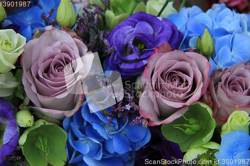 Image of Blue and purple bridal bouquet