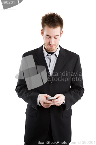 Image of Texting caucasian businessman
