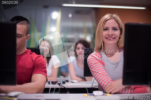 Image of technology students group working  in computer lab school  class