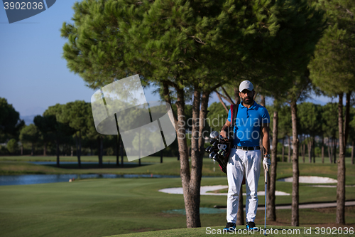 Image of golf player portrait at course