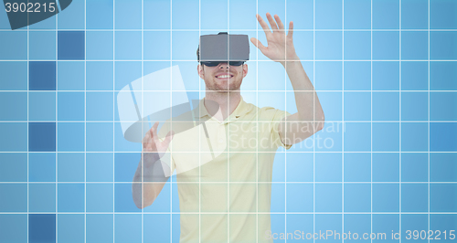 Image of happy man in virtual reality headset or 3d glasses