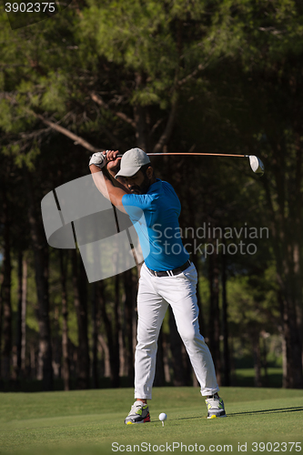 Image of golf player hitting shot