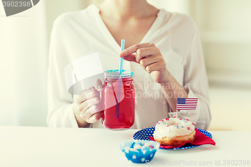 Image of woman celebrating american independence day