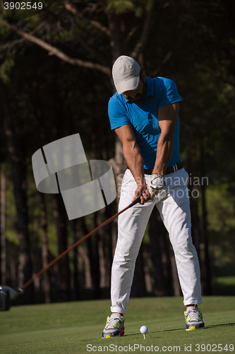 Image of golf player hitting shot