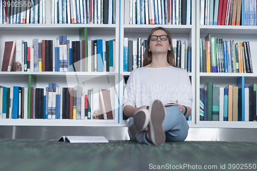 Image of female student study in library