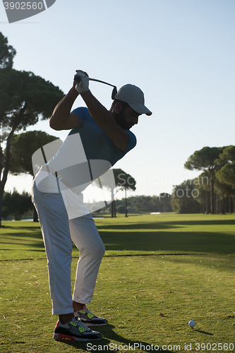 Image of golf player hitting shot