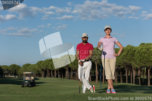 Image of portrait of couple on golf course