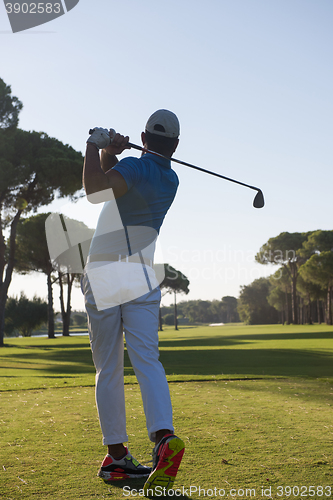 Image of golf player hitting shot