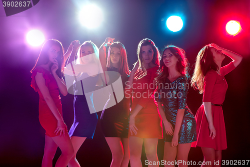 Image of Beautiful girls dancing at the party