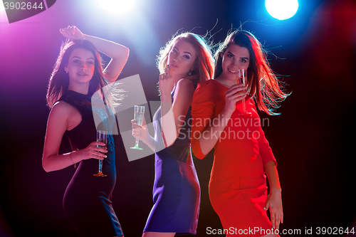 Image of Beautiful girls dancing at the party