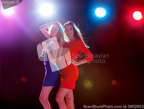 Image of Beautiful girls dancing at the party