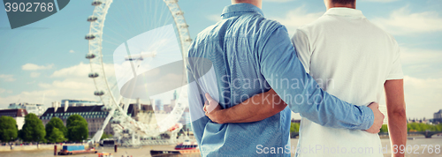 Image of close up of male gay couple over london