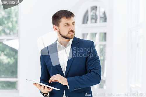 Image of The elegant businessman in  the office