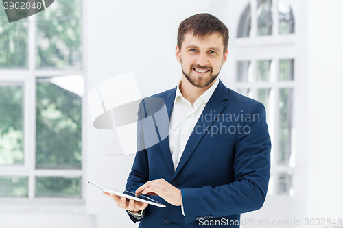 Image of The elegant businessman in  the office