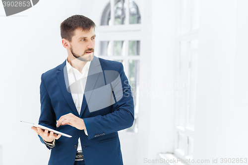 Image of The elegant businessman in  the office