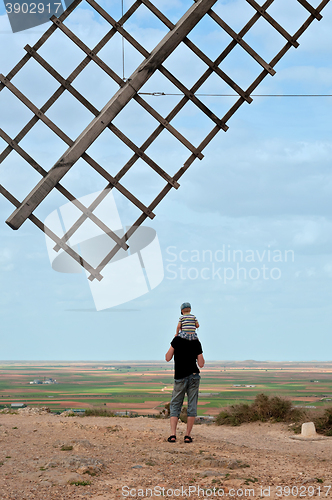 Image of Wooden wing from old windmill and family