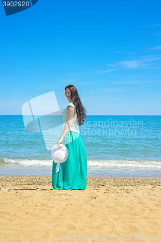 Image of Brunette with long hair on the Mediterranean sea