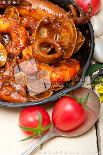 Image of fresh seafoos stew on an iron skillet