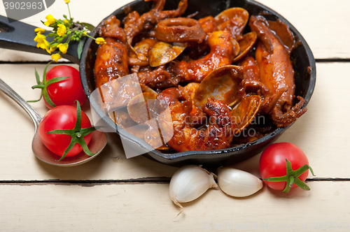 Image of fresh seafoos stew on an iron skillet