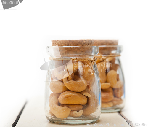 Image of cashew nuts on a glass jar 