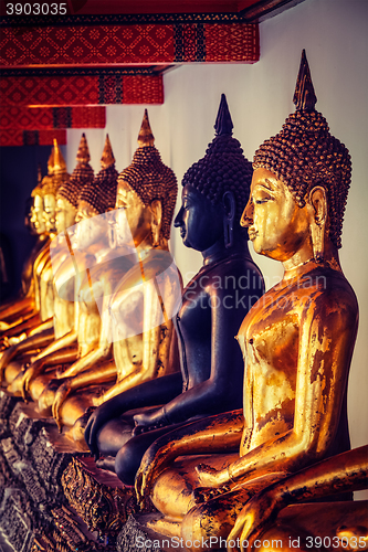 Image of Sitting Buddha statues, Thailand