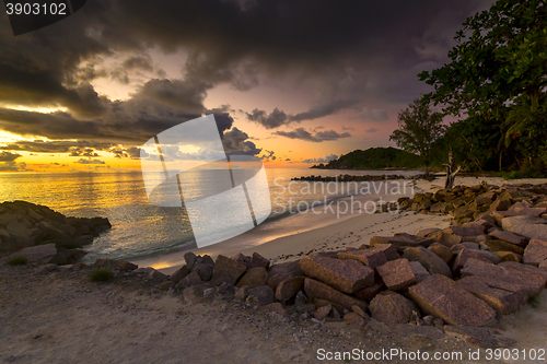 Image of Anse Kerlan beach at the sunset